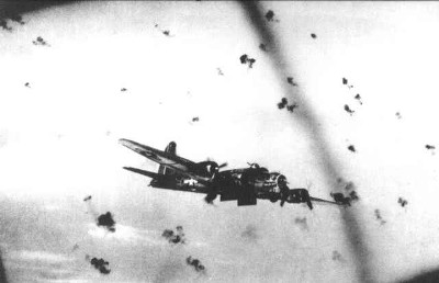 B 17 'Flying Fortress' of the United States Air Corps attacked by Flak over 'Flak-Alley'