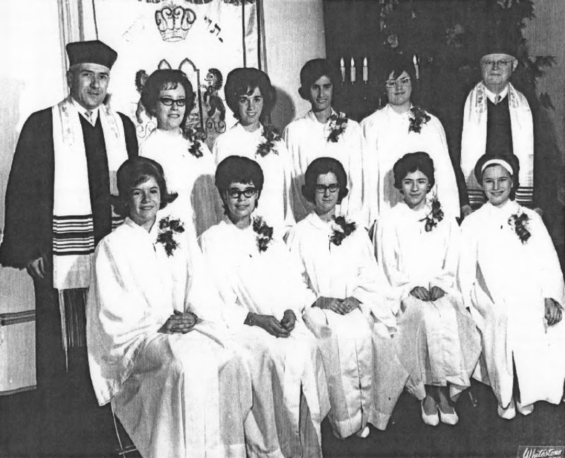 Carole's confirmation at Congregation Habonim in 1965. Rabbi Hugo Hahn at right and Asst. Rabbi Bernhard Cohn on left